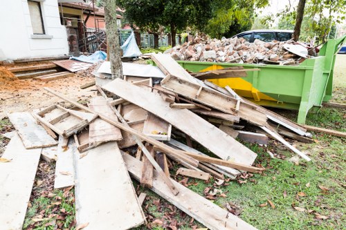 Workers loading shop clearance waste